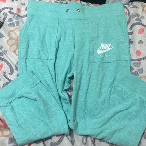 teal nike joggers, the are “high waters”
